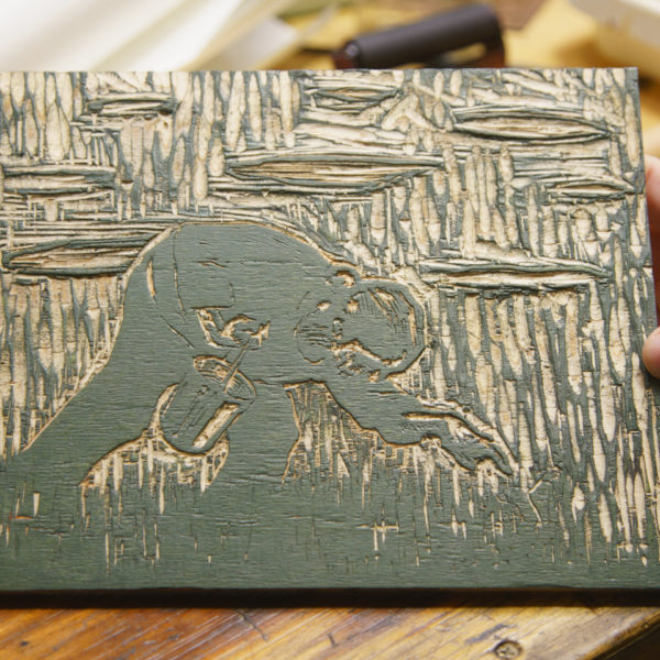 the-picker-woodcut-held-block-web